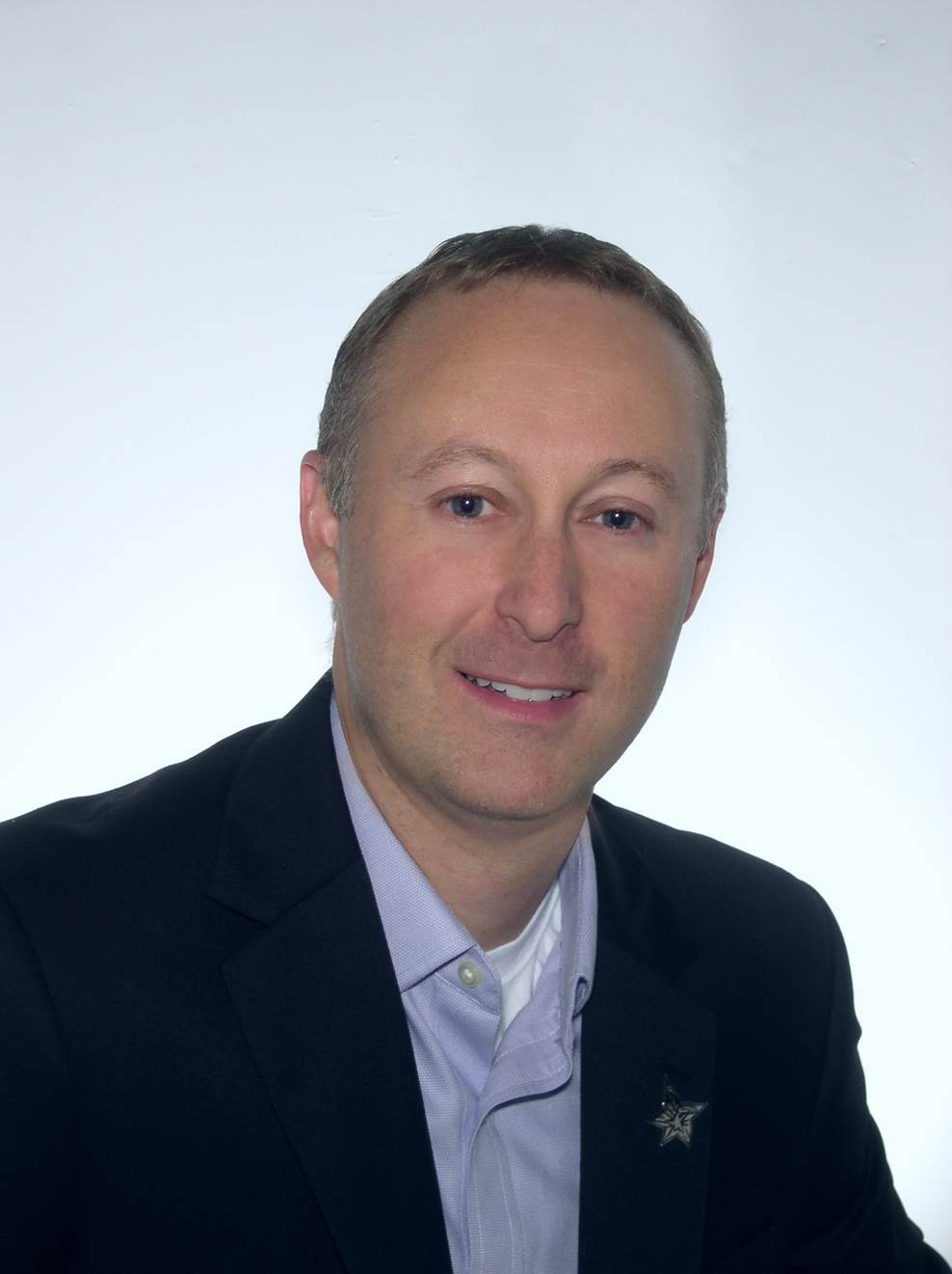 Headshot: Dominique Clement